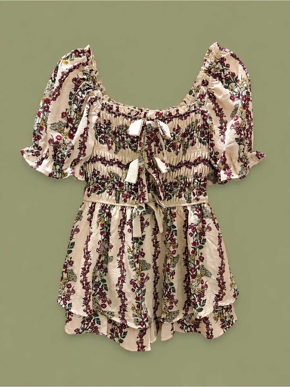 Smocked Floral Peasant Romper in Cream